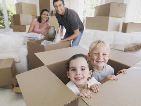 Piano removals team planning a careful move in Earls Court