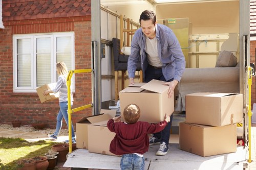 Man and van team safely preparing items for a move in Earls Court