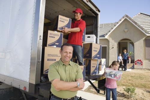 Loading furniture into a van for an Earls Court house or flat move