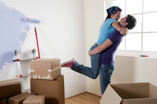 Organised household and business items ready for storage near Earls Court