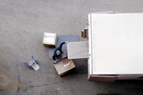 Careful packing and wrapping of fragile household items for an Earls Court move