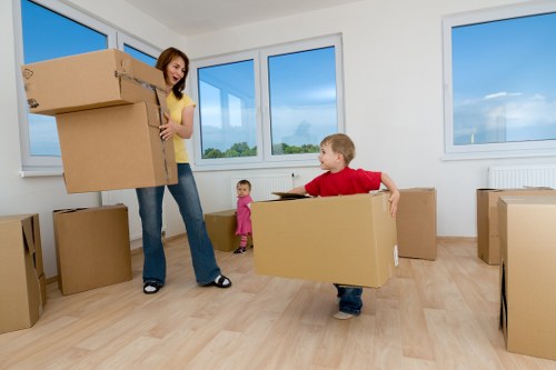 Professional team loading office furniture during a local pick-up in Earls Court