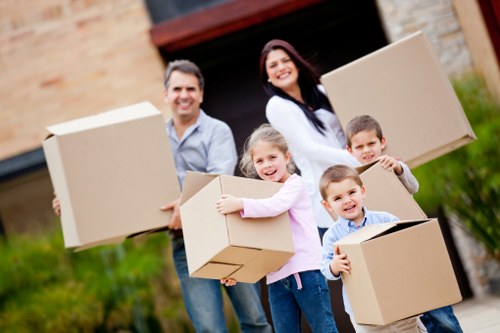 Commercial same day removals setup with office furniture and boxes in Earls Court