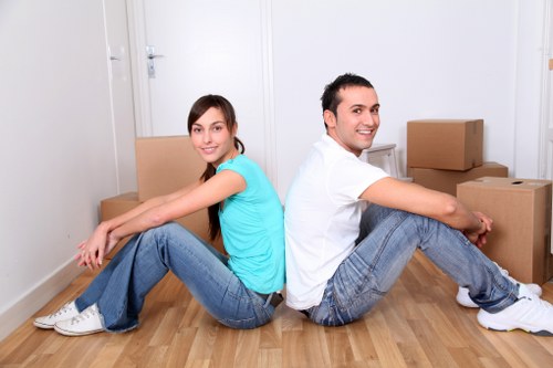 Professional movers handling a flat removal near Earls Court