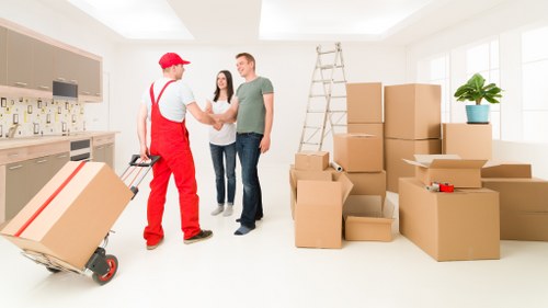 Unpacking boxes into a new home in Earls Court