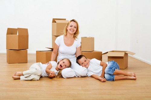 Loading furniture into a removal truck in West London