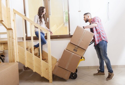 Careful loading of household items for an Earls Court relocation