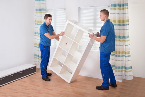Careful handling of boxes and furniture during a student move in Earls Court