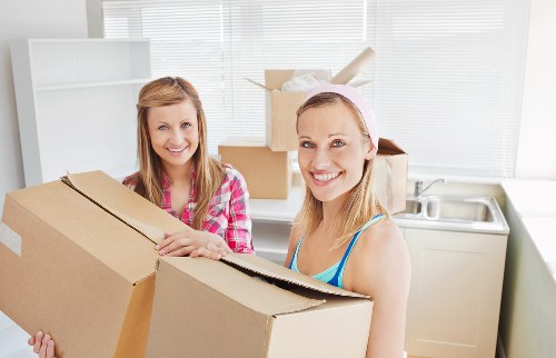 Household furniture being loaded into a removal van in West London